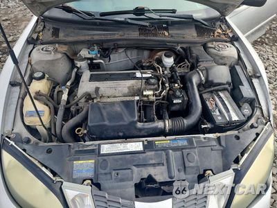 Zdjęcie 11 z 12 samochodu: 2004 PONTIAC SUNFIRE VIN:1G2JB12F747292561 - miniatura