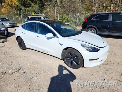 Czwarte zdjęcie samochodu z boku: 2018 TESLA MODEL 3 VIN:5YJ3E1EB2JF089054 - miniatura