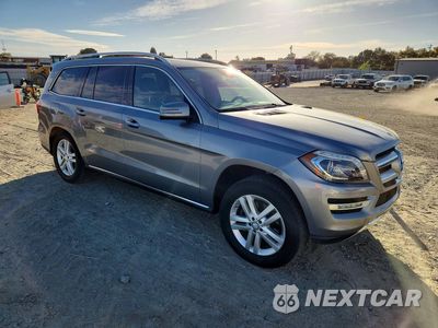 Czwarte zdjęcie samochodu z boku: 2015 MERCEDES-BENZ GL 450 4MATIC VIN:4JGDF6EE4FA510163 - miniatura