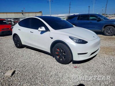 Czwarte zdjęcie samochodu z boku: 2021 TESLA MODEL Y VIN:5YJYGDEE4MF185218 - miniatura