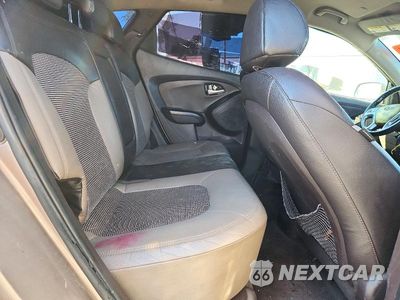 Zdjęcie 10 z 12 samochodu: 2013 HYUNDAI TUCSON GLS VIN:KM8JUCAC2DU623763 - miniatura