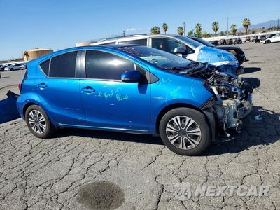 Czwarte zdjęcie samochodu z boku: 2015 TOYOTA PRIUS C TWO VIN:JTDKDTB3XF1092596 - miniatura