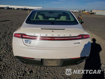 Zdjęcie 6 z 12 samochodu: 2014 LINCOLN MKZ VIN:3LN6L2J93ER824880 - miniatura