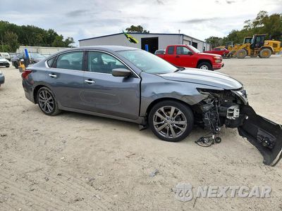 Czwarte zdjęcie samochodu z boku: 2018 NISSAN ALTIMA 2.5 SR VIN:1N4AL3AP3JC255725 - miniatura
