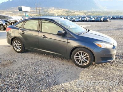Czwarte zdjęcie samochodu z boku: 2018 FORD FOCUS SE VIN:1FADP3F28JL212514 - miniatura