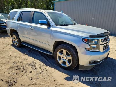 Czwarte zdjęcie samochodu z boku: 2019 CHEVROLET TAHOE C1500 PREMIER VIN:1GNSCCKC7KR213252 - miniatura