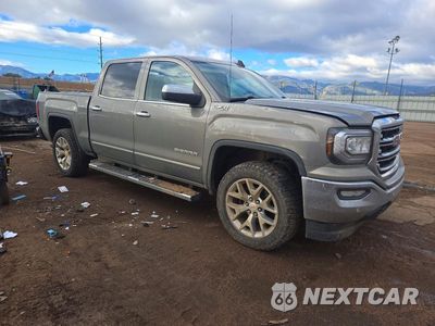 Czwarte zdjęcie samochodu z boku: 2017 GMC SIERRA K1500 SLT VIN:3GTU2NEC0HG320390 - miniatura