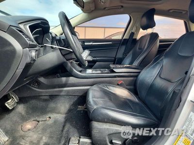 Zdjęcie 7 z 12 samochodu: 2017 FORD FUSION TITANIUM VIN:3FA6P0K91HR130727 - miniatura