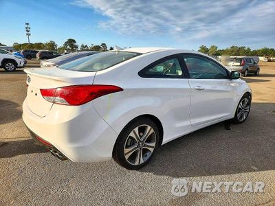 Trzecie zdjęcie samochodu z tyłu: 2013 HYUNDAI ELANTRA COUPE SE VIN:KMHDH6AE9DU002489 - miniatura