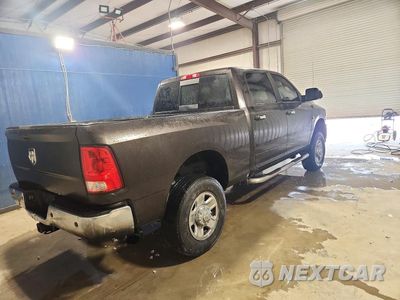 Trzecie zdjęcie samochodu z tyłu: 2016 RAM 2500 SLT VIN:3C6UR5DL6GG191946 - miniatura