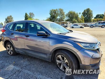 Czwarte zdjęcie samochodu z boku: 2018 HONDA CR-V LX VIN:2HKRW5H32JH424110 - miniatura
