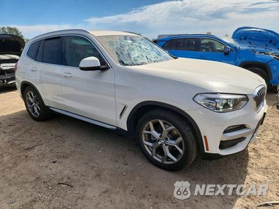 Czwarte zdjęcie samochodu z boku: 2020 BMW X3 XDRIVE30E VIN:5UXTS1C01L9D00219 - miniatura