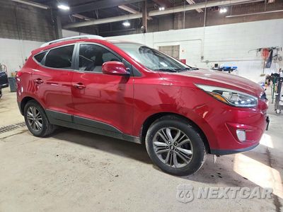 Czwarte zdjęcie samochodu z boku: 2014 HYUNDAI TUCSON SE VIN:KM8JU3AGXEU876477 - miniatura