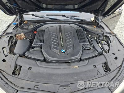 Zdjęcie 11 z 12 samochodu: 2018 BMW M760 XI VIN:WBA7H6C5XJG614853 - miniatura