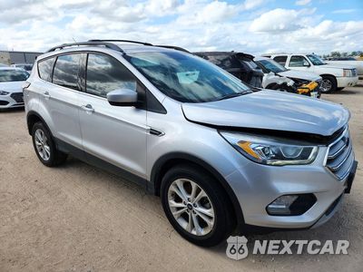 Czwarte zdjęcie samochodu z boku: 2017 FORD ESCAPE SE VIN:1FMCU9G9XHUE71793 - miniatura