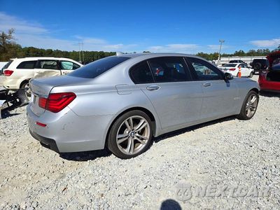 Trzecie zdjęcie samochodu z tyłu: 2014 BMW 740 LI VIN:WBAYE4C52ED138218 - miniatura