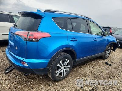 Trzecie zdjęcie samochodu z tyłu: 2018 TOYOTA RAV4 LE VIN:JTMBFREV7JJ187619 - miniatura