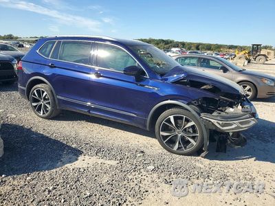 Czwarte zdjęcie samochodu z boku: 2022 VOLKSWAGEN TIGUAN SEL R-LINE VIN:3VV4B7AXXNM089307 - miniatura