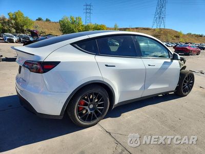 Trzecie zdjęcie samochodu z tyłu: 2020 TESLA MODEL Y VIN:5YJYGDEF0LF009919 - miniatura