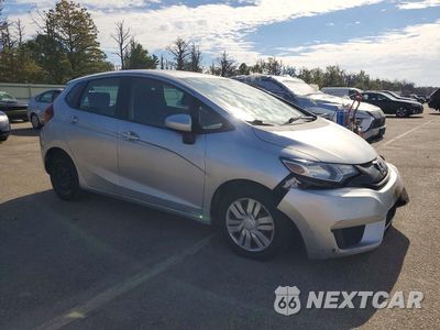 Czwarte zdjęcie samochodu z boku: 2015 HONDA FIT LX VIN:3HGGK5G55FM711143 - miniatura