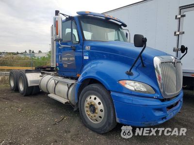 Czwarte zdjęcie samochodu z boku: 2012 INTERNATIONAL PROSTAR SEMI TRUCK VIN:1HSDJSJR3CJ053014 - miniatura