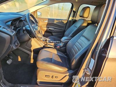 Zdjęcie 7 z 12 samochodu: 2014 FORD ESCAPE TITANIUM VIN:1FMCU0J90EUD51467 - miniatura