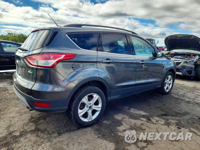 Trzecie zdjęcie samochodu z tyłu: 2016 FORD ESCAPE SE VIN:1FMCU9G96GUC17416 - miniatura