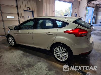 Drugie zdjęcie samochodu z przodu: 2017 FORD FOCUS TITANIUM VIN:1FADP3N24HL316929 - miniatura