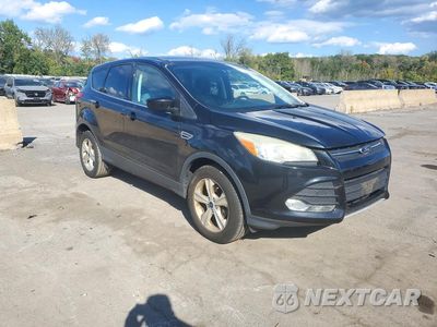 Czwarte zdjęcie samochodu z boku: 2014 FORD ESCAPE SE VIN:1FMCU9GX3EUE05144 - miniatura