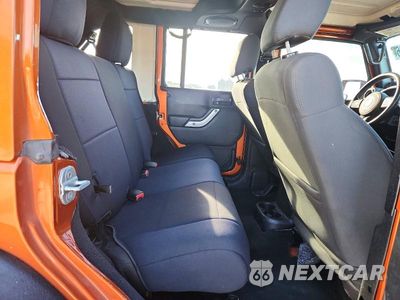 Zdjęcie 11 z 13 samochodu: 2011 JEEP WRANGLER UNLIMITED SAHARA VIN:1J4BA5H13BL604184 - miniatura