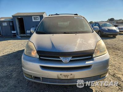 Piąte zdjęcie samochodu w środku: 2004 TOYOTA SIENNA VIN:5TDBA22CX4S001636 - miniatura
