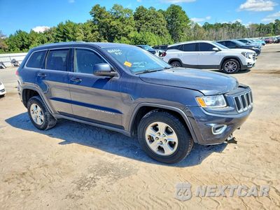 Czwarte zdjęcie samochodu z boku: 2016 JEEP GRAND CHEROKEE LAREDO VIN:1C4RJFAG1GC468962 - miniatura