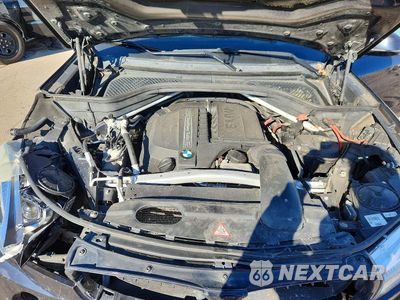 Zdjęcie 11 z 12 samochodu: 2014 BMW X5 SDRIVE35I VIN:5UXKR2C57E0H33043 - miniatura
