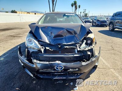 Piąte zdjęcie samochodu w środku: 2016 TOYOTA PRIUS C FOUR VIN:JTDKDTB36G1126177 - miniatura