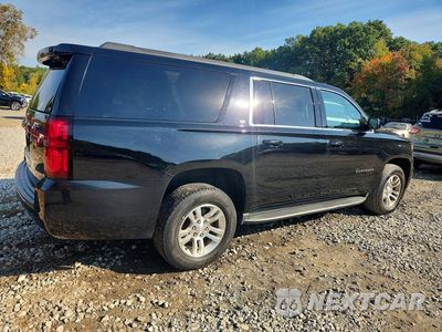 Trzecie zdjęcie samochodu z tyłu: 2019 CHEVROLET SUBURBAN K1500 LT VIN:1GNSKHKC5KR141984 - miniatura