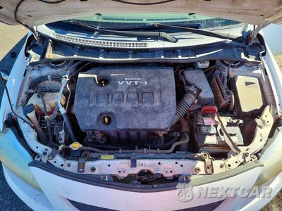 Zdjęcie 11 z 12 samochodu: 2010 TOYOTA COROLLA LE VIN:1NXBU4EE4AZ296283 - miniatura