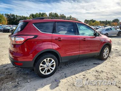 Trzecie zdjęcie samochodu z tyłu: 2018 FORD ESCAPE SE VIN:1FMCU9GD2JUC16033 - miniatura