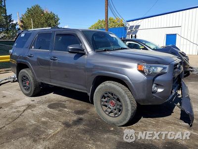 Czwarte zdjęcie samochodu z boku: 2022 TOYOTA 4RUNNER SR5 VIN:JTEMU5JR9N6031974 - miniatura