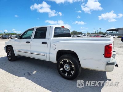 Drugie zdjęcie samochodu z przodu: 2005 DODGE DAKOTA QUAD SLT VIN:1D7HE48N35S304209 - miniatura