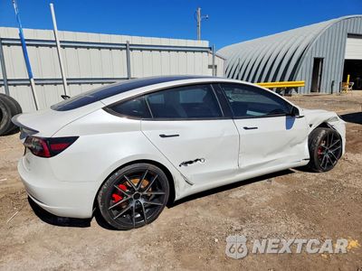 Trzecie zdjęcie samochodu z tyłu: 2022 TESLA MODEL 3 VIN:5YJ3E1EC3NF158834 - miniatura