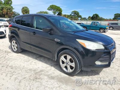 Czwarte zdjęcie samochodu z boku: 2014 FORD ESCAPE SE VIN:1FMCU9G9XEUB04436 - miniatura