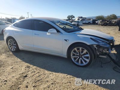 Czwarte zdjęcie samochodu z boku: 2018 TESLA MODEL 3 VIN:5YJ3E1EB0JF146626 - miniatura