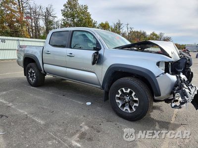 Czwarte zdjęcie samochodu z boku: 2023 TOYOTA TACOMA TRD OFF-ROAD VIN:3TMCZ5AN2PM575766 - miniatura