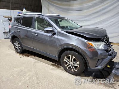 Czwarte zdjęcie samochodu z boku: 2016 TOYOTA RAV4 LE VIN:JTMBFREV0GJ056265 - miniatura