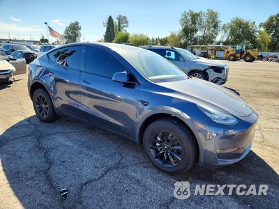 Czwarte zdjęcie samochodu z boku: 2023 TESLA MODEL Y VIN:7SAYGDEE4PA025439 - miniatura