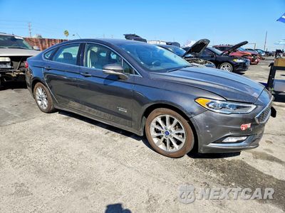 Czwarte zdjęcie samochodu z boku: 2017 FORD FUSION TITANIUM PHEV VIN:3FA6P0SU3HR255510 - miniatura