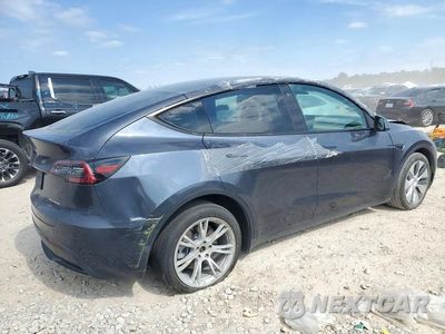 Trzecie zdjęcie samochodu z tyłu: 2021 TESLA MODEL Y VIN:5YJYGDEE5MF272335 - miniatura