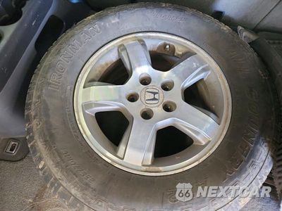 Zdjęcie 13 z 14 samochodu: 2007 HONDA PILOT EX VIN:2HKYF18427H532510 - miniatura
