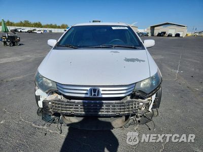 Piąte zdjęcie samochodu w środku: 2010 HONDA INSIGHT EX VIN:JHMZE2H78AS008907 - miniatura