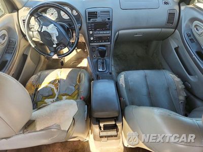 Zdjęcie 8 z 13 samochodu: 2001 NISSAN MAXIMA GXE VIN:JN1CA31D11T624888 - miniatura